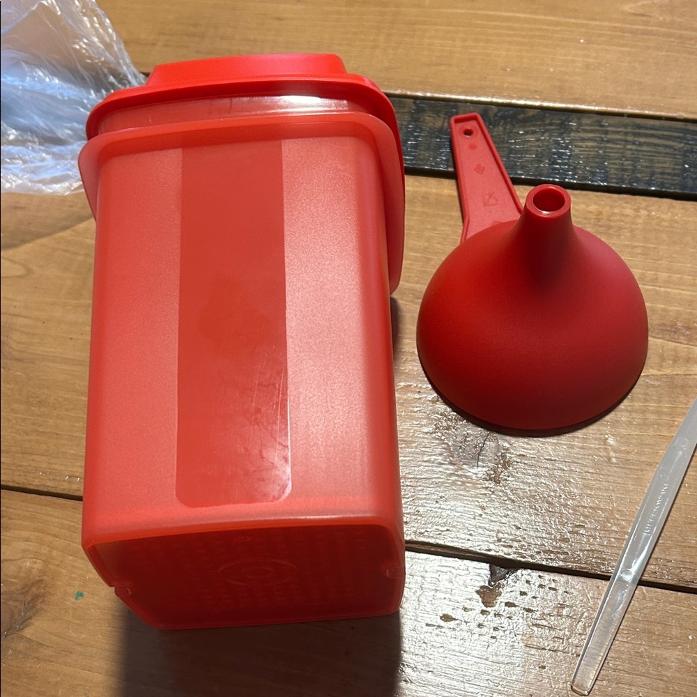 Tupperware Red pickle keeper, funnel and citrus peeler